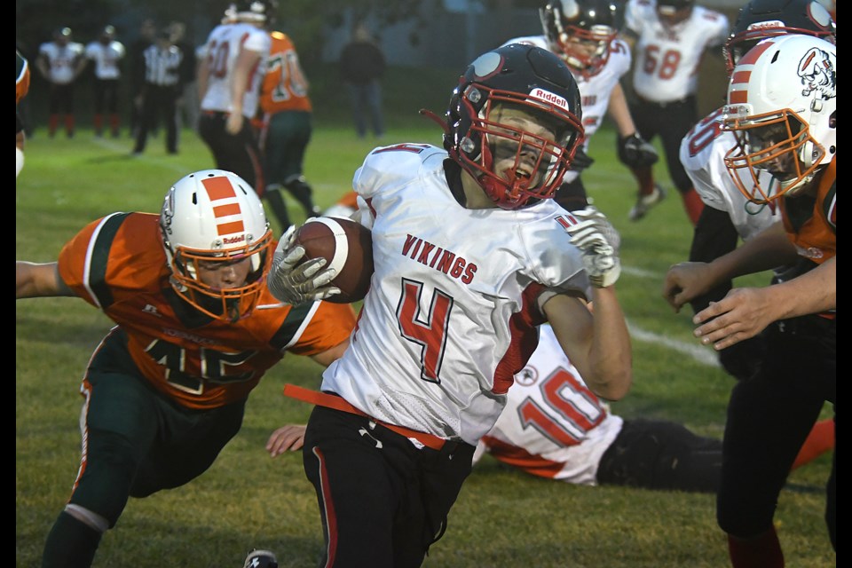 Vanier running back Joel Marak evades the Peacock defence on this carry in the first half. | Randy Palmer