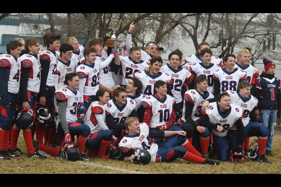 The Estevan Elecs celebrate after winning the Sask Rural Football League Tier II title.