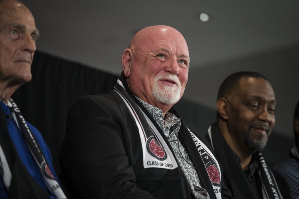 Former Saskatchewan Roughriders president and CEO Jim Hopson offers remarks during the Canadian Football Hall of Fame induction announcement in Hamilton. Canadian Press photo