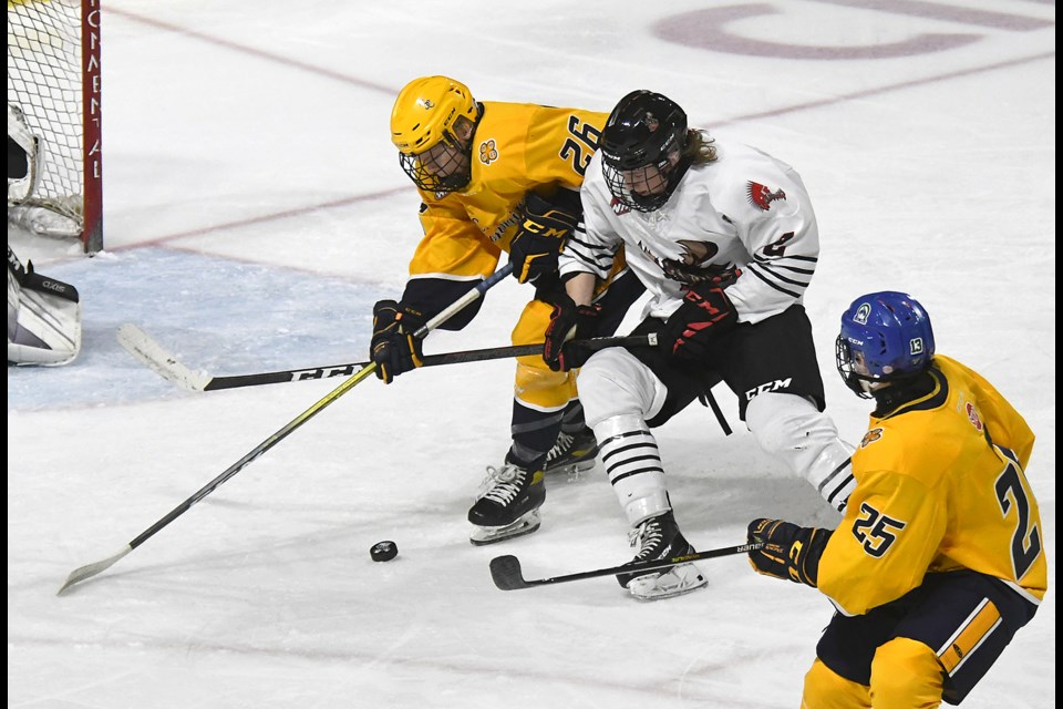 Wyatt Lacoste attempts to get a shot off against a Swift Current defender.