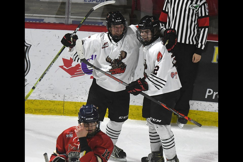 The Warriors celebrate after their ninth goal of Friday’s contest.