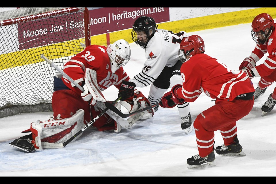 AAA Warriors forward Connor McGrath couldn’t quite jam home this shot.