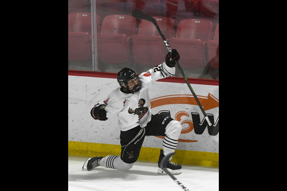 Chris Otterson celebrates after scoring the Warriors’ opening goal.