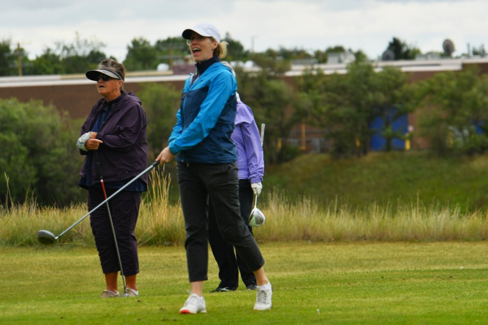 Scenes from the Women Fore Women golf tournament.