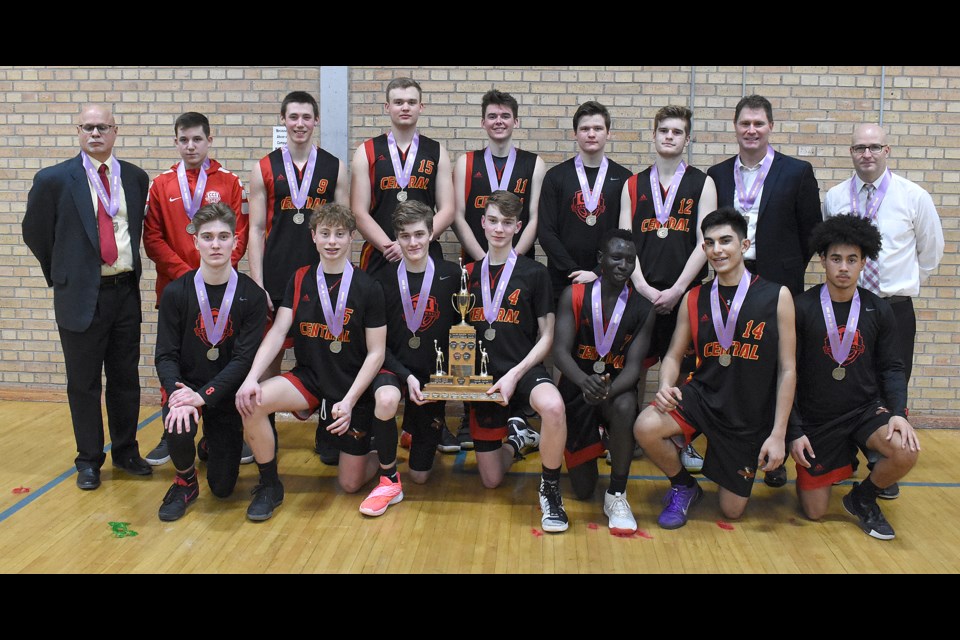 A common occurrence from the start of the season, the Central Cyclones pose with the championship trophy and their medals, this time after winning the city championship.