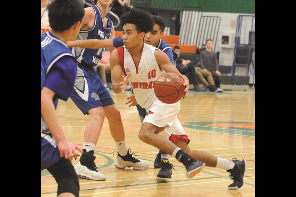 Central's Quinton Ross drives to the basket against Saskatoon Walter Murray during the championship final. Randy Palmer photograph