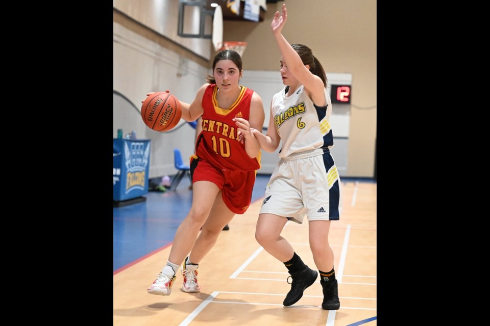 Central Cyclones Brooklyn
Watterson tries to get around Cornerstone Falcons Anna Thorn  