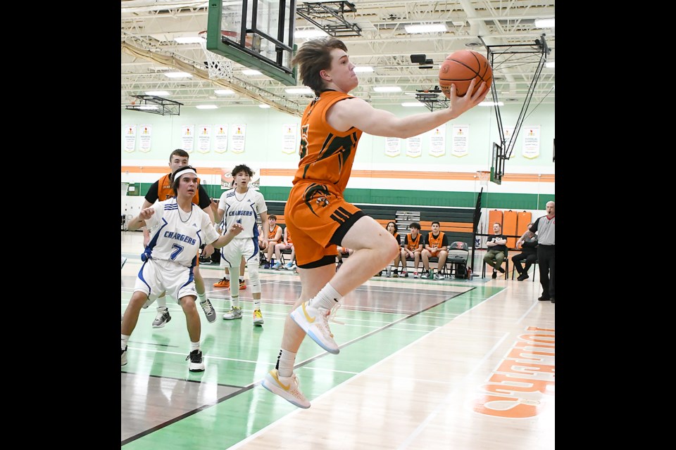 Peacock’s Owen Varjassy successfully kept the play alive on this baseline scramble.