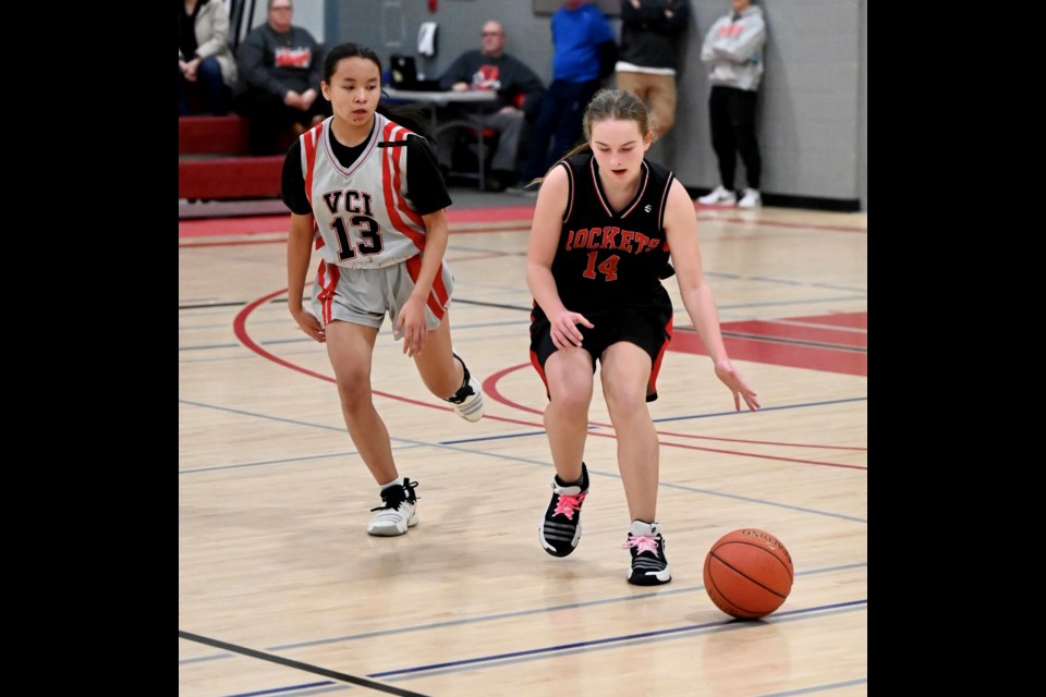 Spirits Selene Ramos (left) pursues the Rockets Georgia Lagradonis