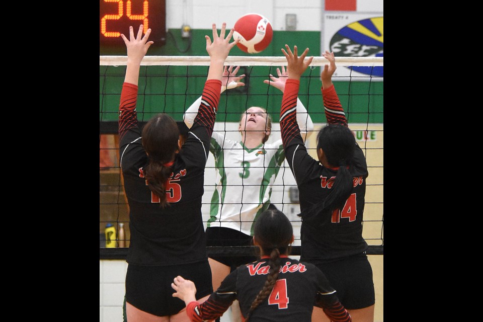 Action from the high school girls semifinal between the Peacock Toilers and Vanier Spirits on Thursday night.