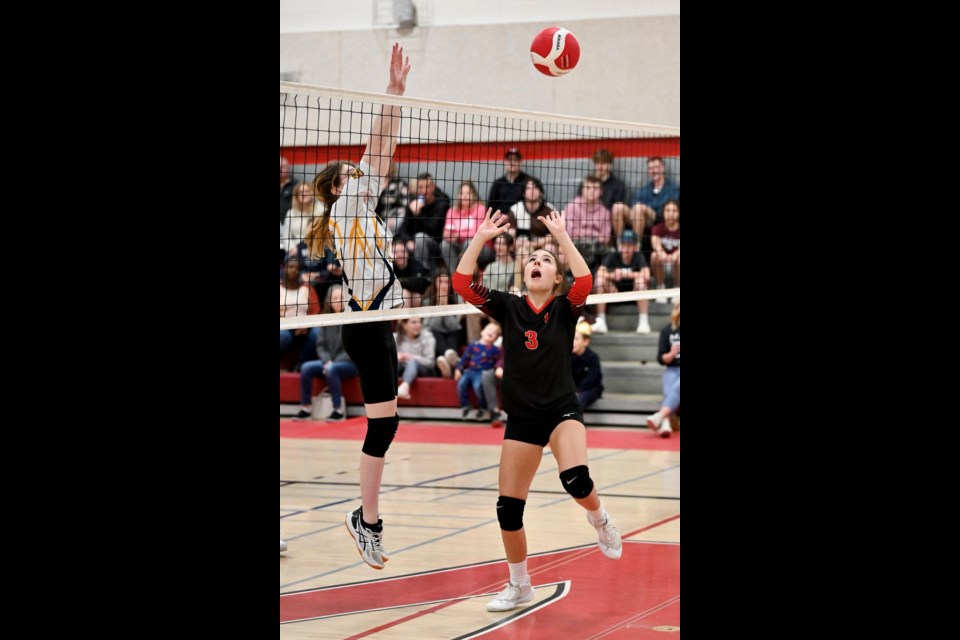 The Cornerstone Christian School Falcons (left) at the net against the Vanier Spirits in earlier, regular season league play