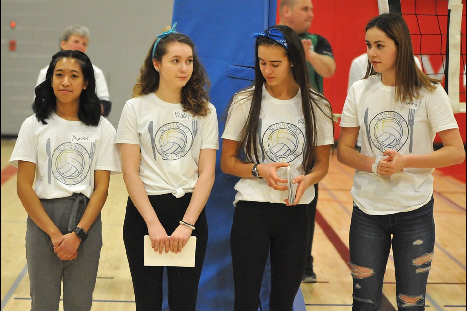 The Vanier Collegiate organizers of the Sets4Supper charity volleyball games – Aimee Dumlao, Madison DeCorby, Allison Grajczyk-Jelinski and Jenna Meili -- receive applause for their hard work. Randy Palmer photograph