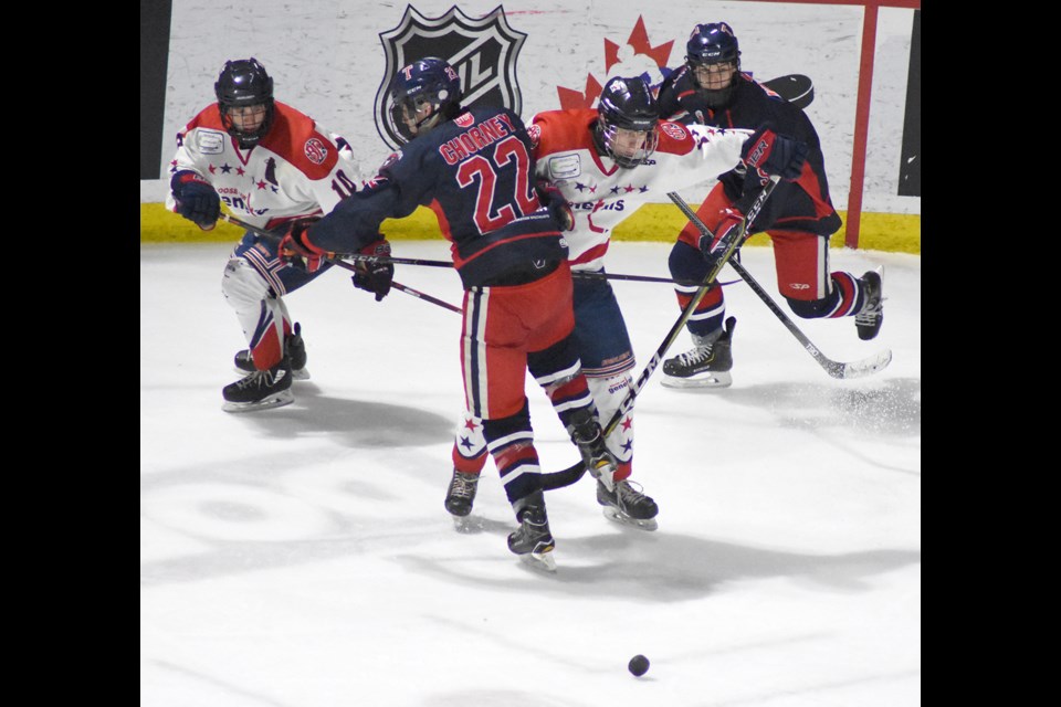 The Generals' Steven Kesslering lays a hit on Tisdale's Davis Chorney. Randy Palmer photograph