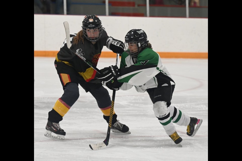  BREAK PAST REBELS HANNAH GATES
Mavericks Maria Umana (right) attempts to break past Rebels Hannah Gates 