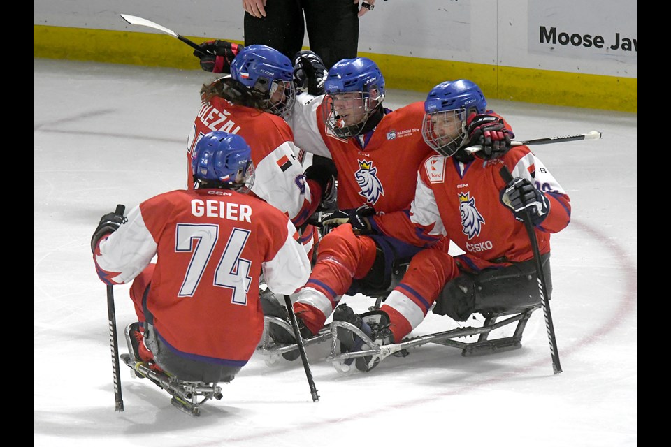 Team Czechia celebrates after scoring their second goal.