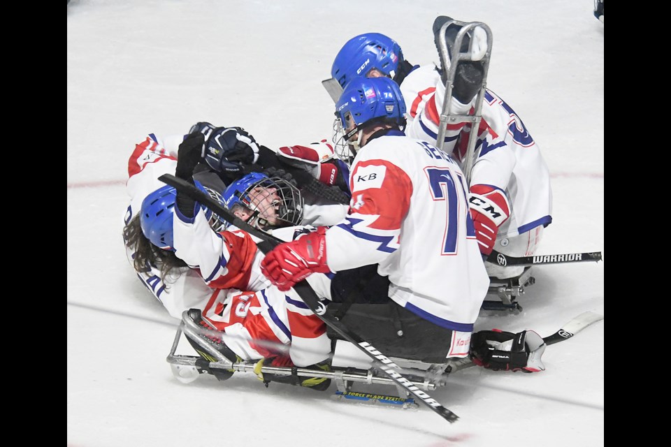 Team Czechia celebrate after Patrick Sedlacek scored the opening goal of the game and the tournament.