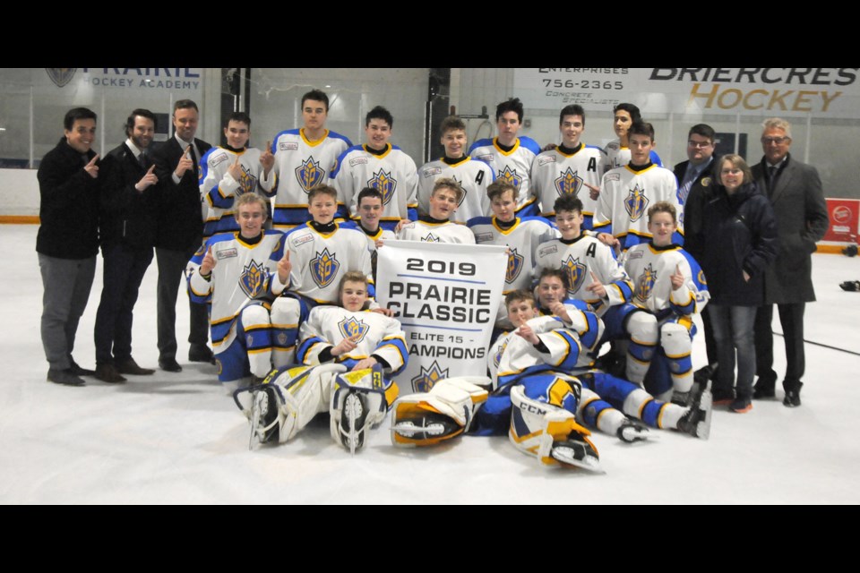 Players with the Prairie Hockey Academy gather for a team photo after their Prairie Classic tourney win. Randy Palmer photograph