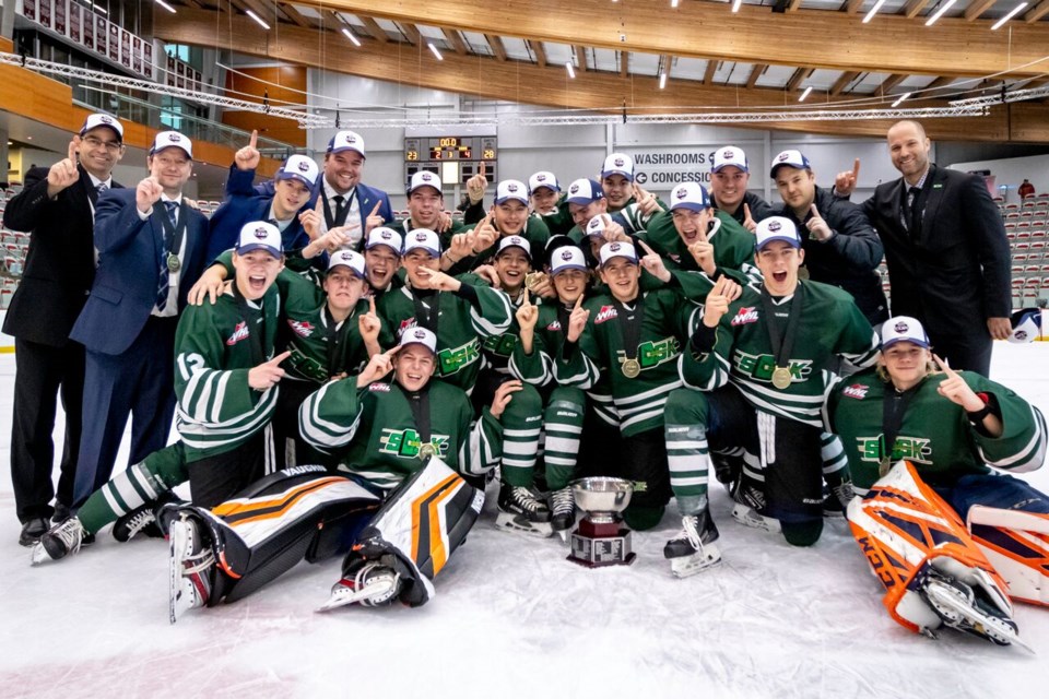 Moose Jaw AAA Warriors goaltender Dylan Ernst and Team Saskatchewan celebrate their WHL Cup victory.