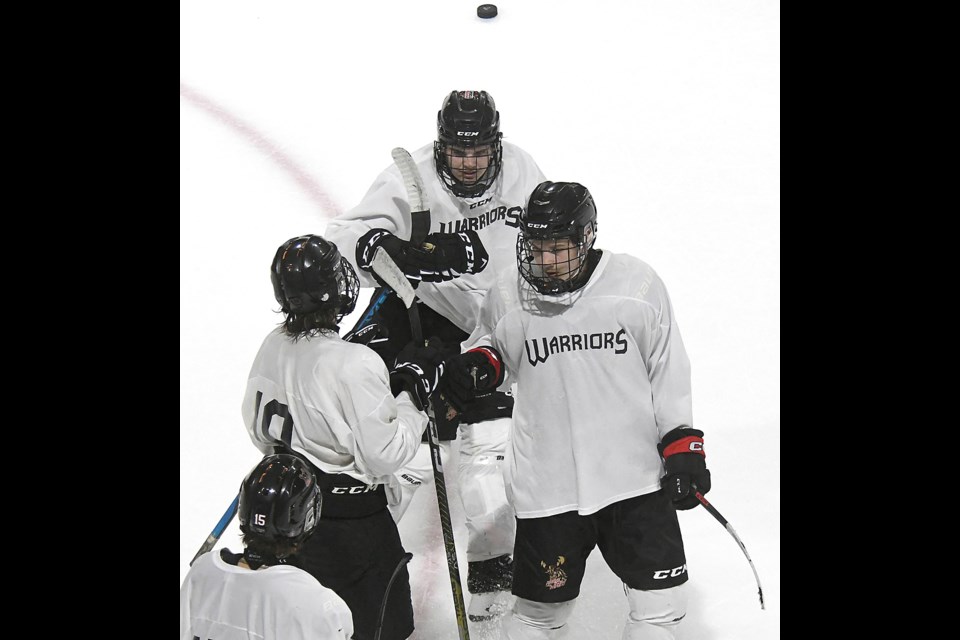 Action from the pre-season opener between the Moose Jaw Winmar Warriors and Swift Current Legionnaires.