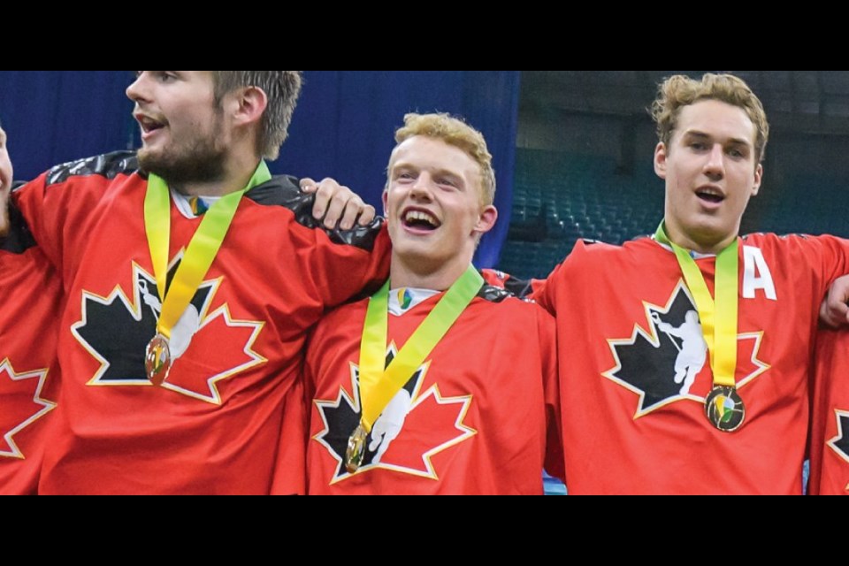 Quinn Ingalls celebrates with Team Canada teammates after winning the International Indoor Junior Lacrosse world championship last summer. Quinn Ingalls Twitter photo