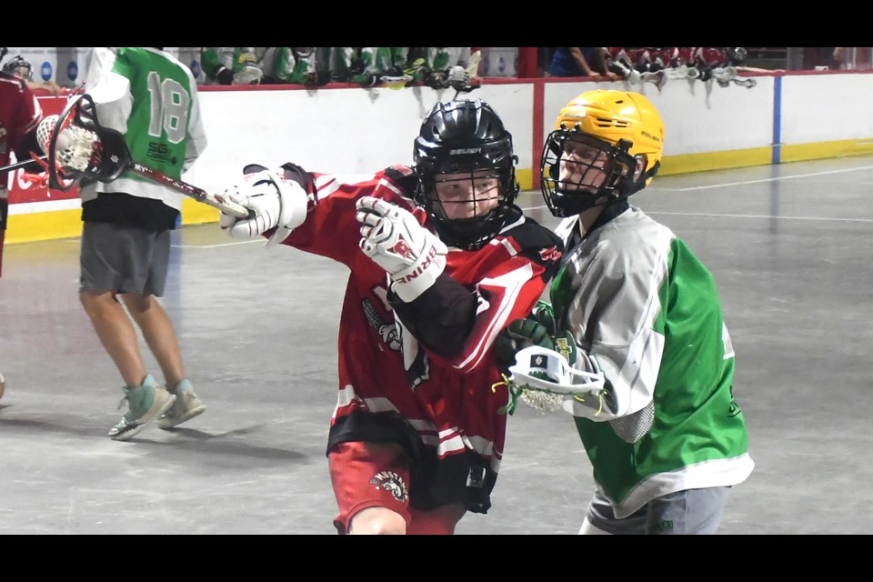 Action from the 14-and-under provincial championship round-robin game between the Moose Jaw Mustangs and Regina Outlaws.