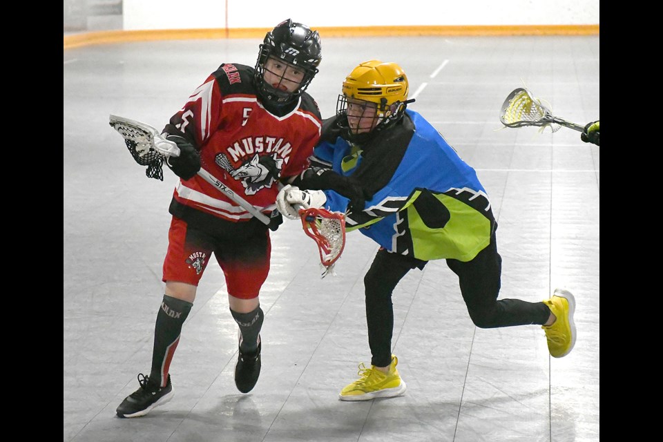 Action from the Moose Jaw Mustangs win over the Regina Crossfire in South Sask Lacrosse League action on Wednesday night.