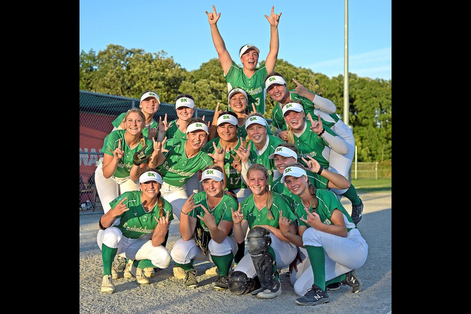 Team Saskatchewan gathers for an impromptu team photo after their playoff win over New Brunswick