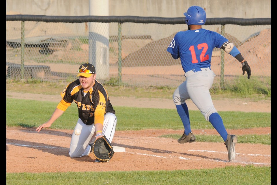 Express first baseman Casey Zarr gets down to pick the throw after third baseman Geordie McDougall made a diving stop and gunned down Melville’s Tracy Warren (12).