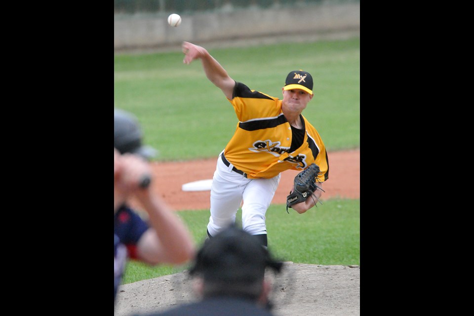 Miller Express graduated senior Mitchell Robinson delivers a pitch during action last season.