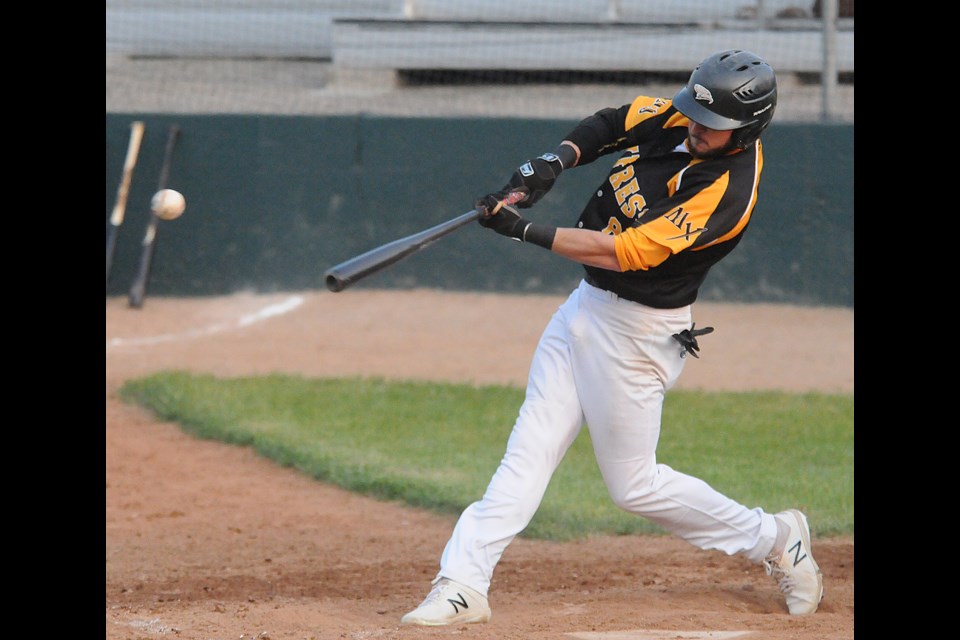 Miller Express centerfielder Eric Marriott raps one of his two base hits against the Swift Current 57’s on Friday night.