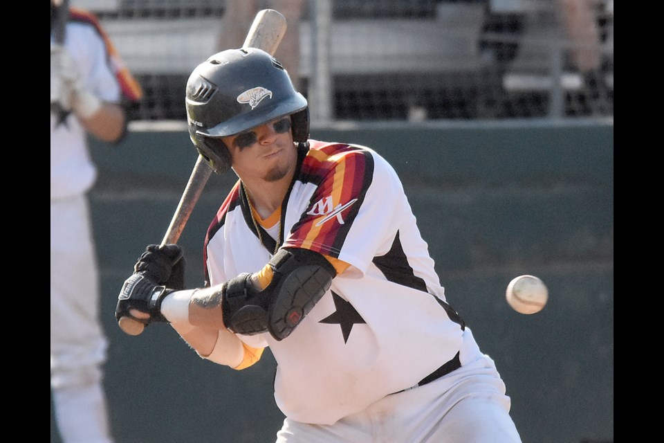 Miller Express catcher Markus Melendez – sporting the throwback Moose Jaw Astros jersey – keeps an eye on a Swift Current pitch.