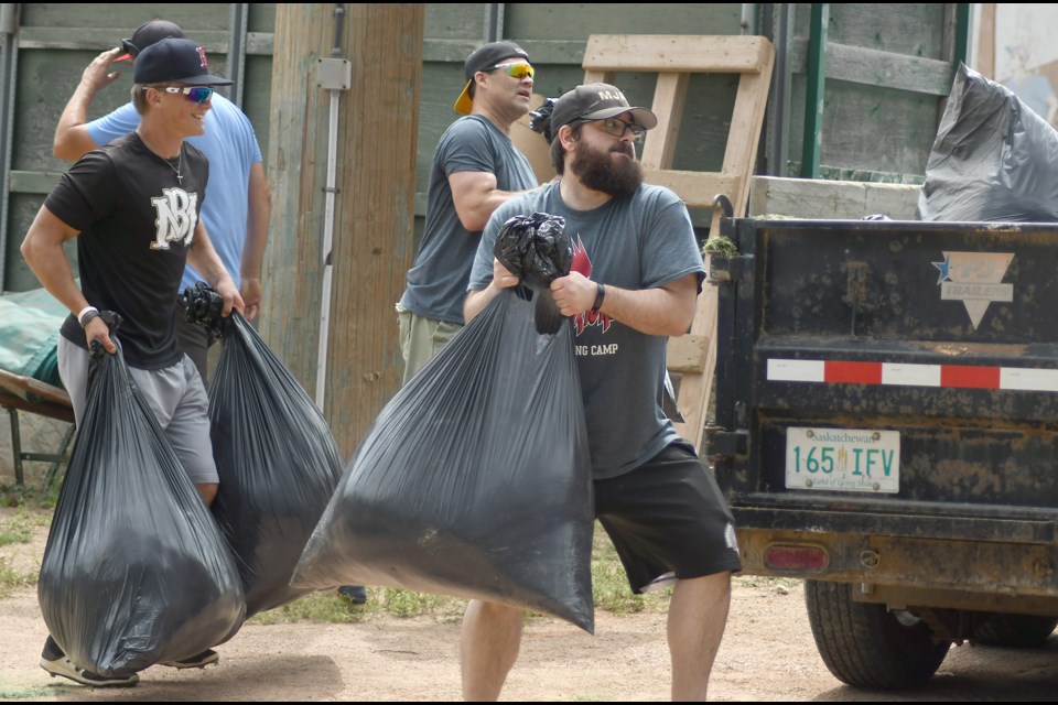 Moose Jaw Miller Express volunteer James Gallo was joined by general manager Cory Olafson and team president Darryl Pisio along with a crew of others working on Ross Wells Park on Saturday afternoon.