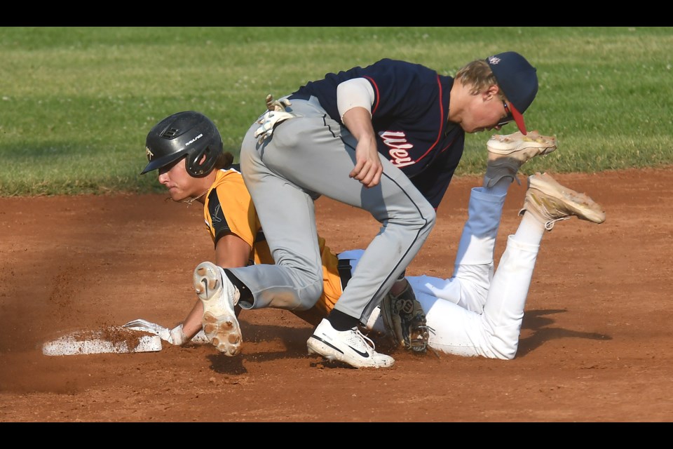Moose Jaw baserunner Andrew Rantz slides safely into second with one of two stolen bases in game one.