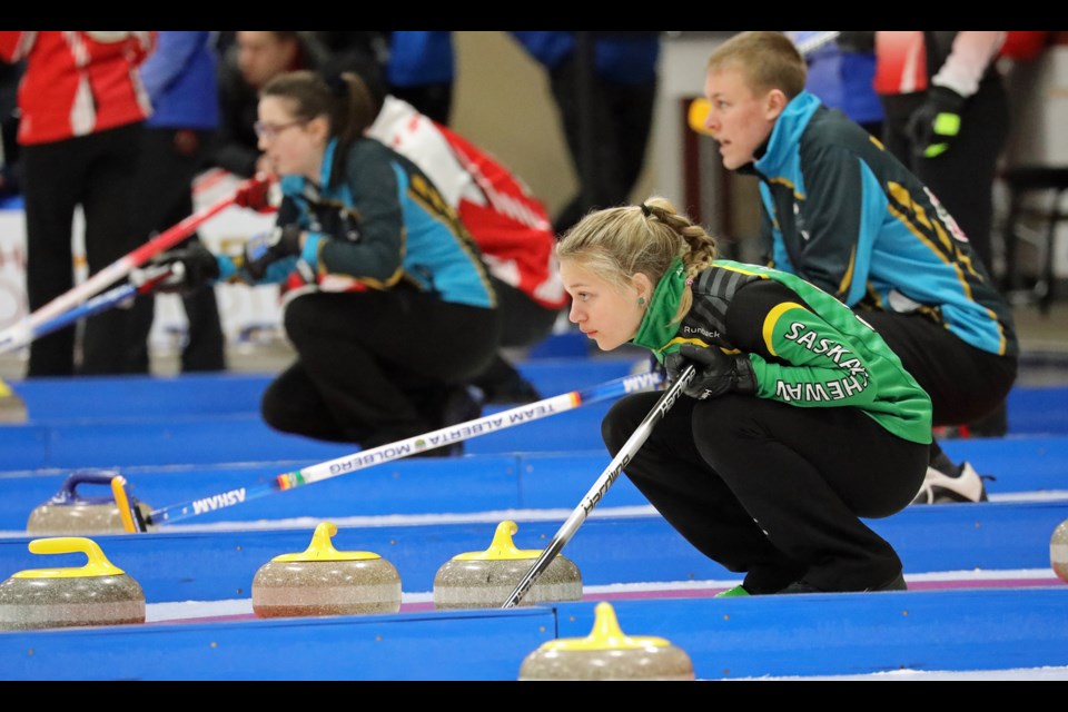 Team Sask skip Skylar Ackerman watches the line on a shot. Mark Cundict/Canada Games photo