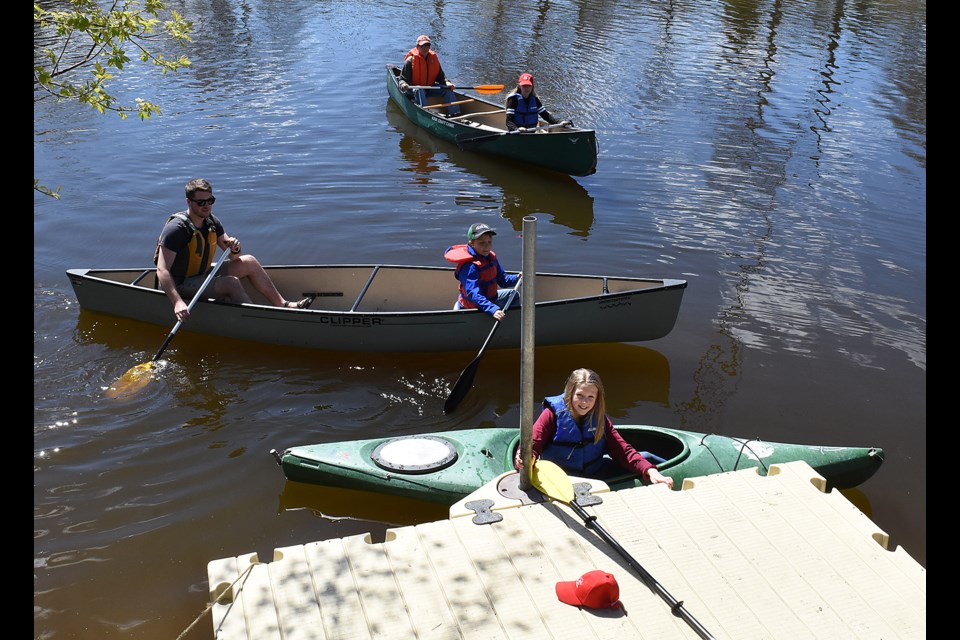 Paddlers return from a jaunt around the Moose Jaw River and Plaxton’s Lake during the Moose Jaw Canoe and Kayak Club open house on Sunday.