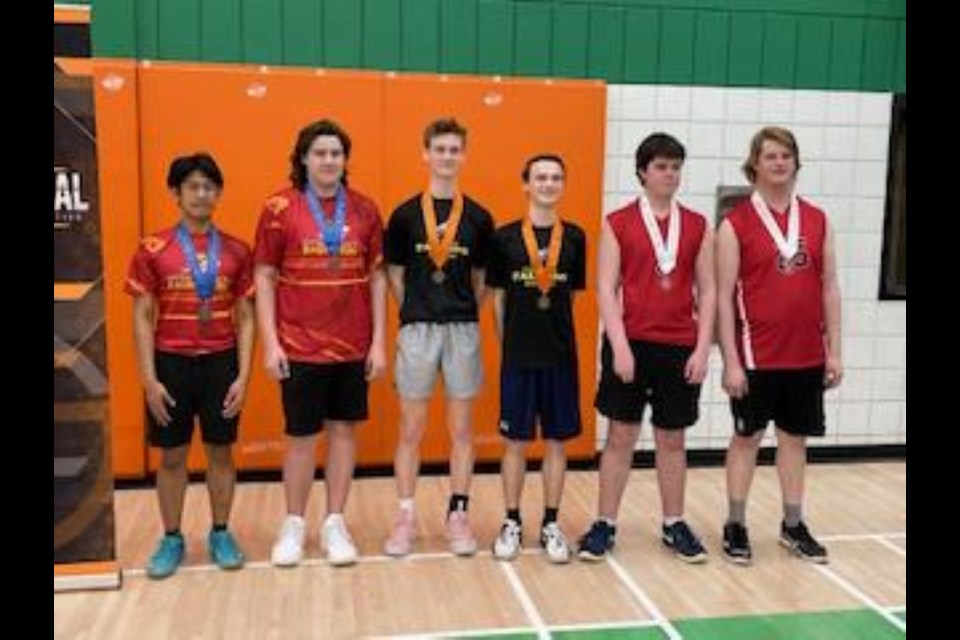 The South Central boys doubles senior badminton champions are Drew Biette and Tanner Behrns (Cornerstone, gold, centre), Gabriel Calub and Austin Smith (Central, silver, left), Chase Callaghan and Ryan Duncan (Avonlea, bronze, right).