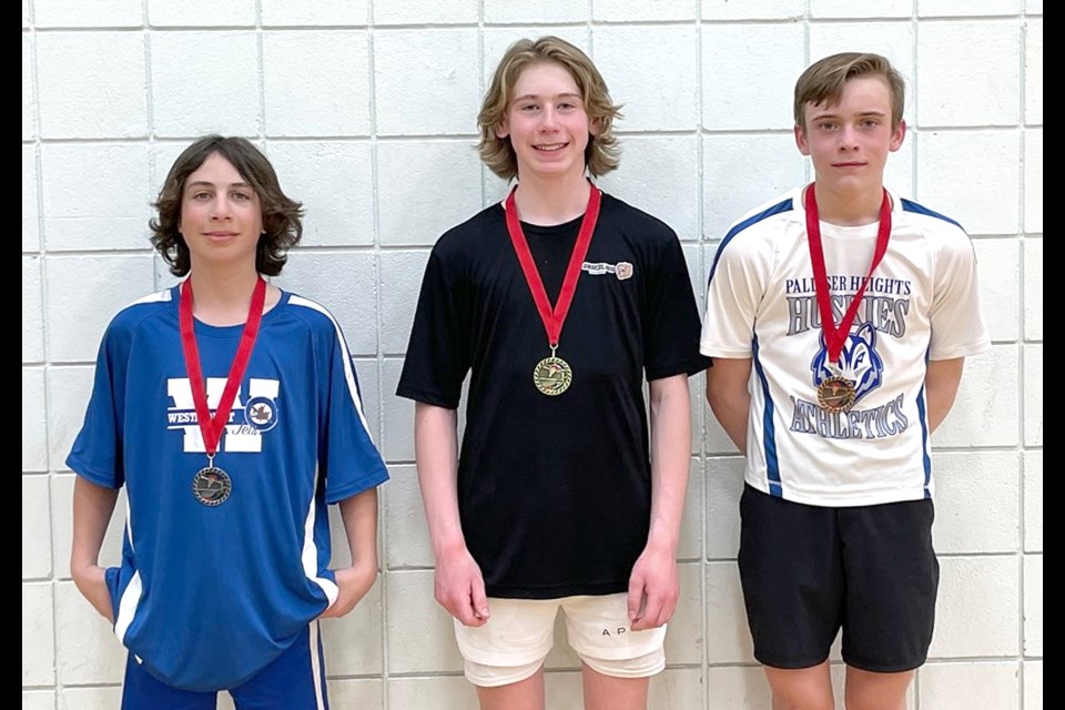 Sunningdale’s Rhyen Ubell (centre) took first place in the boys singles division, while Westmount’s Torsten Erickson (left) was the silver medalist and Palliser Height’s Reid Weiss landed bronze.