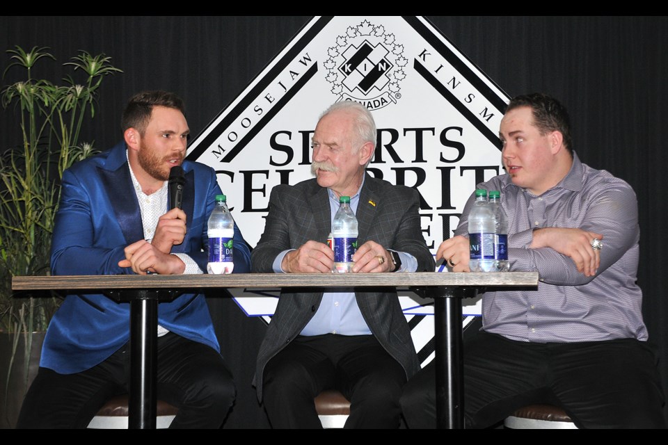 NHL legend Lanny McDonald (centre) and Roughriders standout Chris Best listen in to one of Blue Jays pitcher Joe Biagini's many entertaining stories during the 2018 Kinsmen Sports Celebrity Banquet.