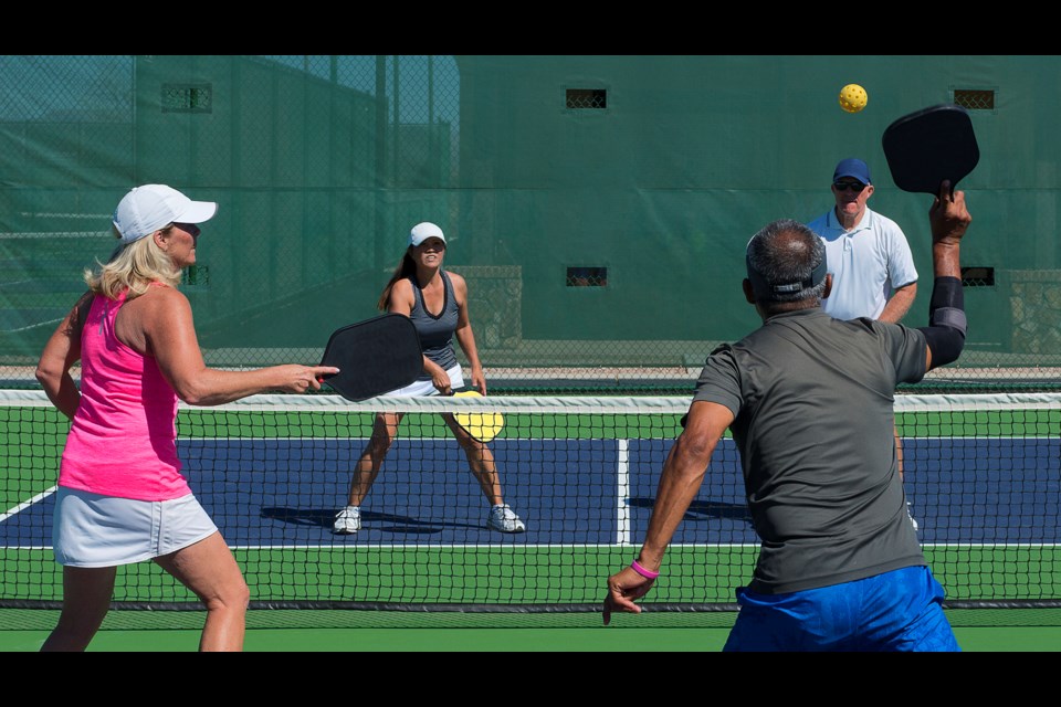 Athletes playing pickleball. Photo by Getty Images
