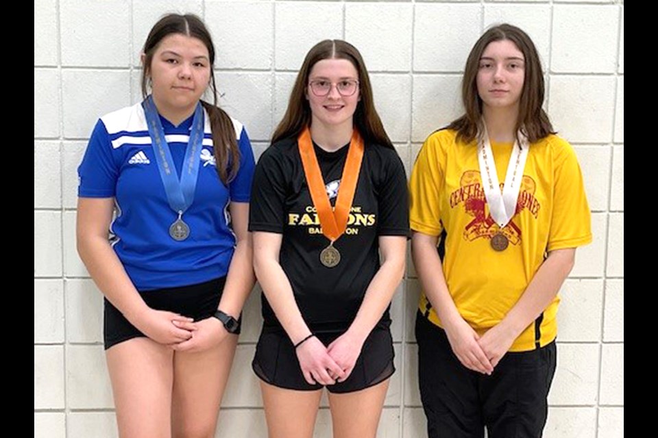 Winners of the South Central District badminton girls singles championship were gold medalist Kiana Hrechka (Cornerstone, centre), silver medalist Stacey Auger (Gravelbourg, left) and bronze medalist Mickayla Carle (Central).