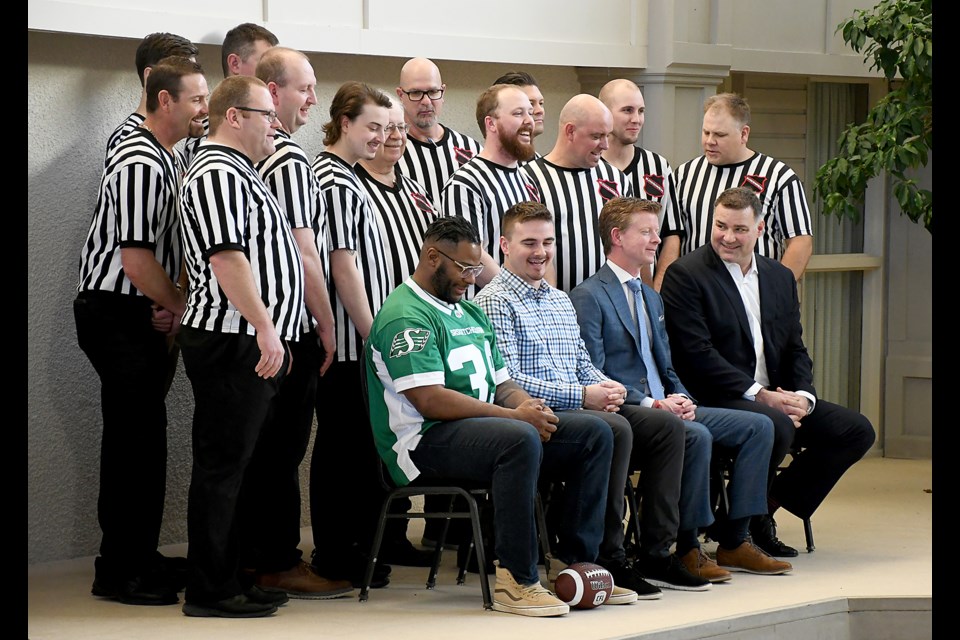 Members of the Moose Jaw Kinsmen Club gather for photos with Saskatchewan Roughriders defensive lineman Charleston Hughes, Toronto Blue Jays catcher Reese McGuire, Sportsnet host Jamie Campbell and NHL Hall of Famer Eric Lindros.