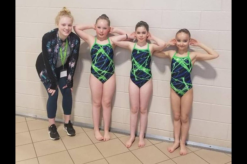 Alysa Beattie (coach),  Emily Boese, Ava Rosso, Macey Binsfeld took to the pool in the 10-and-under division.