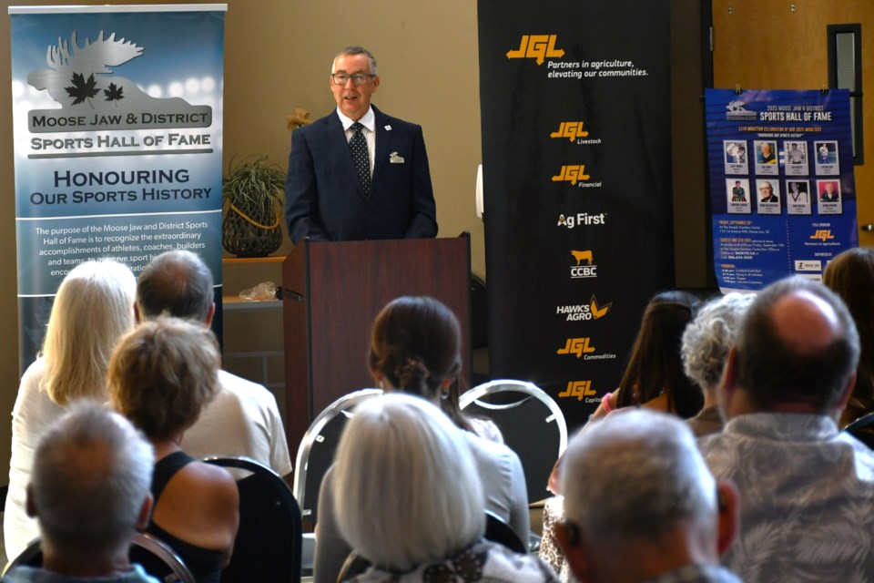 Larry Graham, president of the Moose Jaw and District Sports Hall of Fame, speaks during the 2025 induction class announcement at the Temple Gardens Centre on Aug. 21.