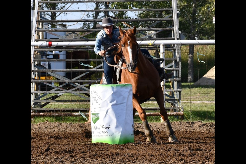 Farrah Fogg goes around barrel number one.