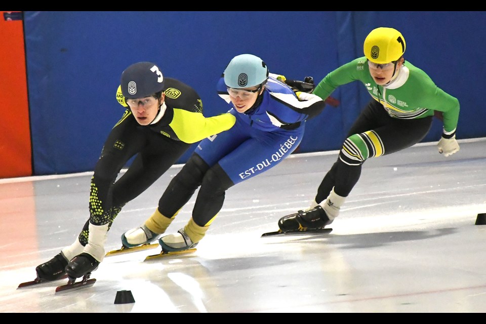 Moose Jaw competitor Marcus Capili leads Anne Boudreau-Alexandre and Mikko Veeman around a corner.