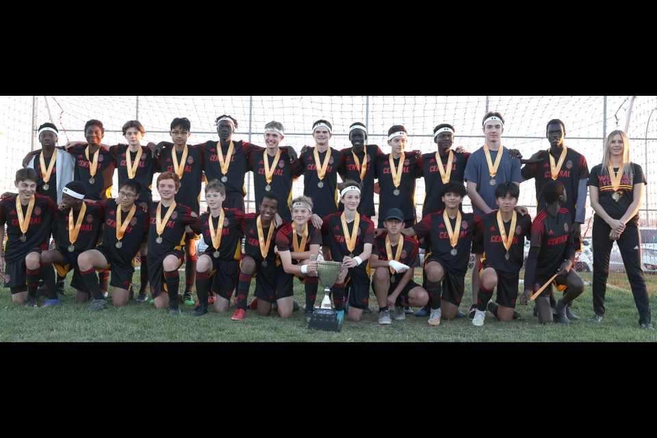 The Central Cyclones gather with the Moose Jaw High School Athletic Association boys soccer championship trophy.