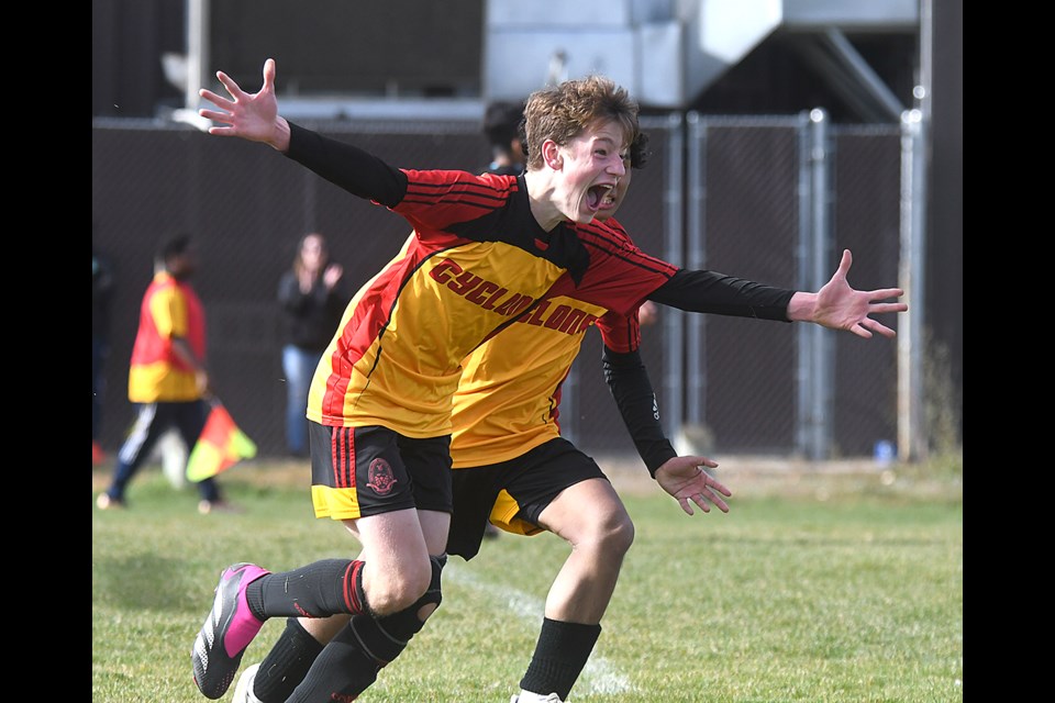 Central’s Patrick Pryadko celebrates after scoring the game-tying goal as time ran down in regulation in the boys regional soccer semifinal.