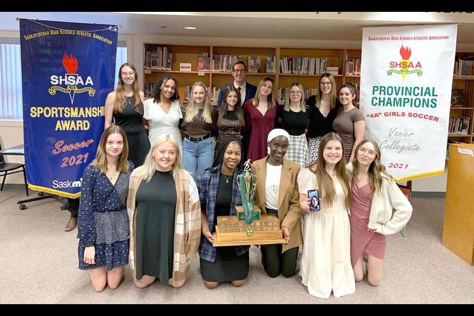 The Vanier Spirits girls soccer team gathers with their SaskMilk SHSAA Sportsmanship Award.