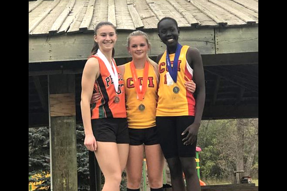 Medalists in the Senior girls division include Brooklyn Roney (Peacock, bronze), Jadyn Palaschuk (Central, gold), Akuol Riak (Central, silver).