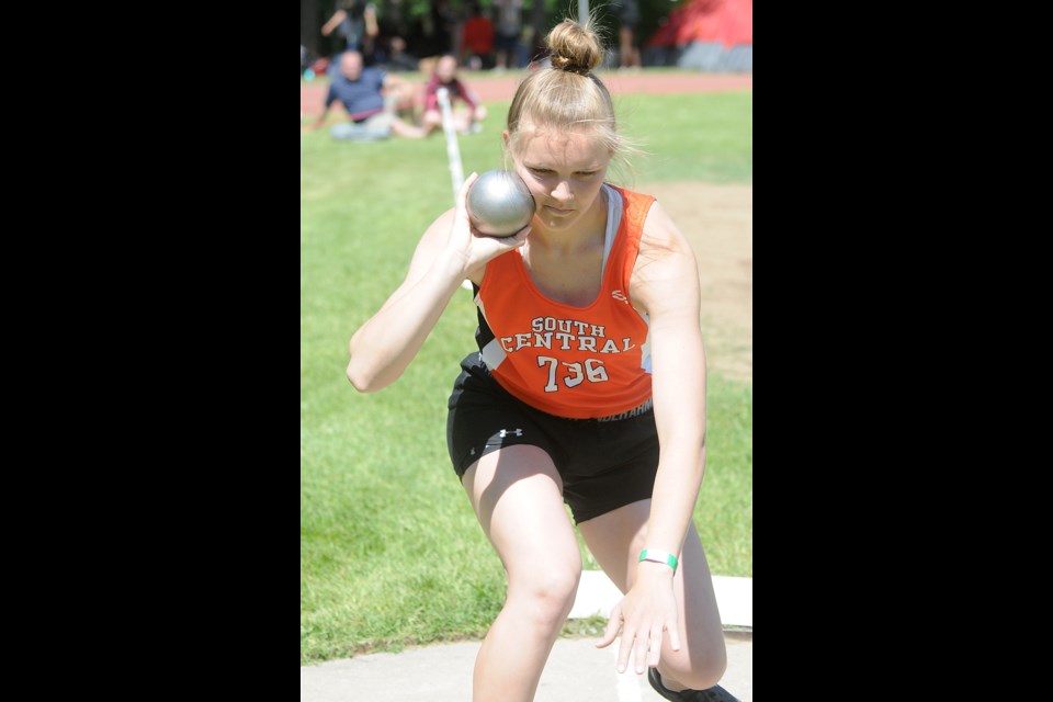Caronport's Melissa Ellis competes in the senior girls quad shot put.